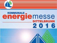 Das Bild zeigt das Banner der Kommunalen Energiemesse Dittelbrunn 2016. Der Titel "Kommunale Energiemesse" ist prominent in roter Schrift auf einem hellen Hintergrund platziert, begleitet von grafischen Elementen wie einem Gebäude und stilisierten Blättern.